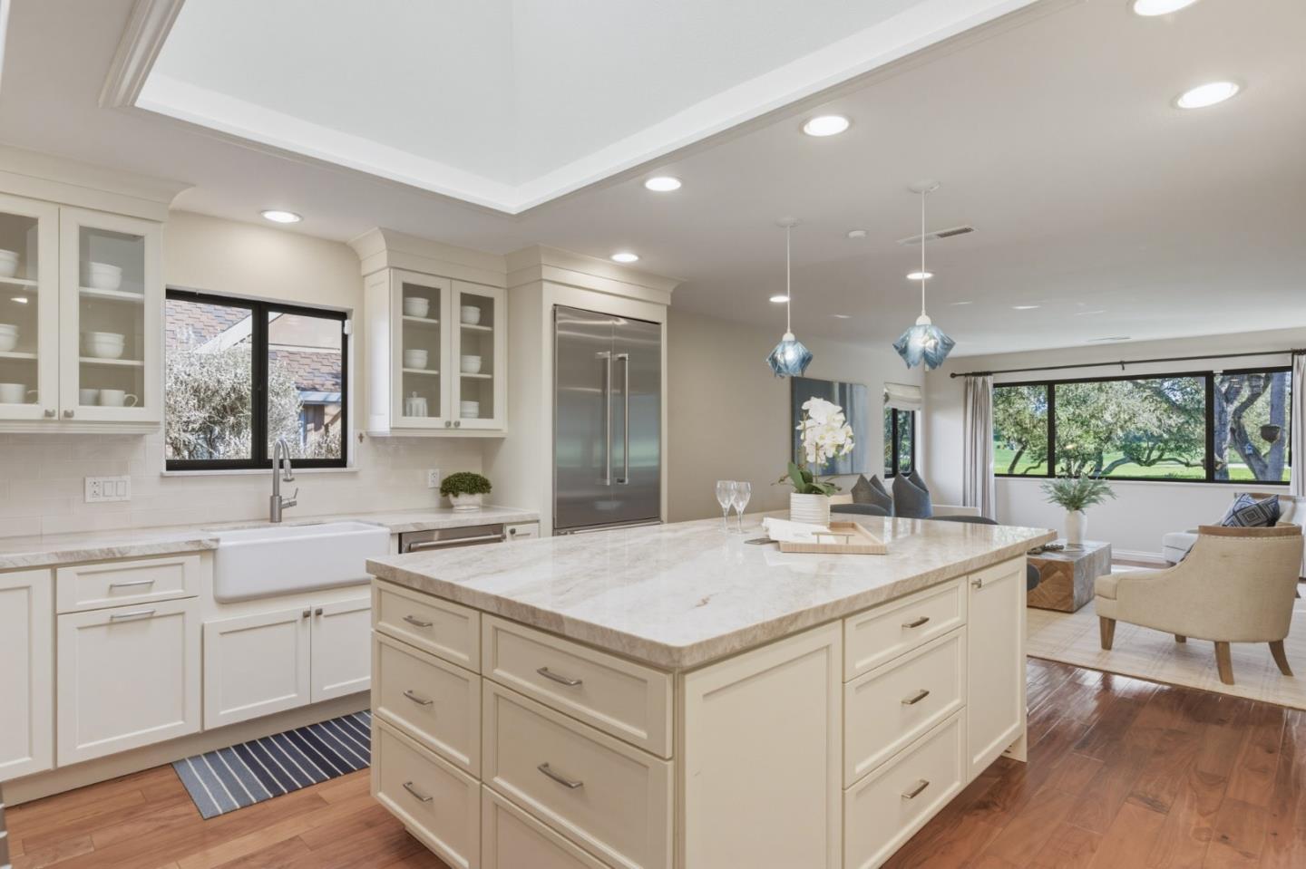 1057 Broncho Road Pebble Beach, CA 93953 - Photo 15 of 21 a view of a kitchen counter space a sink wooden floor and appliances
