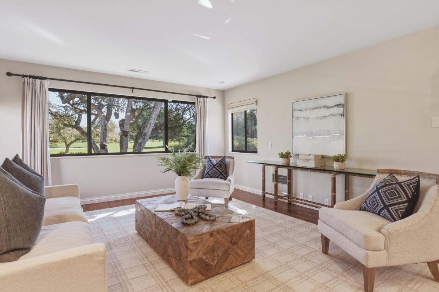 1057 Broncho Road Pebble Beach, CA 93953 - Photo 16 of 21 a living room with furniture and a large window