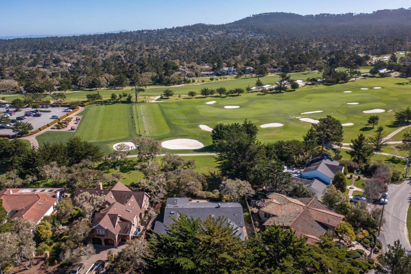 1057 Broncho Road Pebble Beach, CA 93953 - Photo 2 of 21 a view of a lake with a mountain