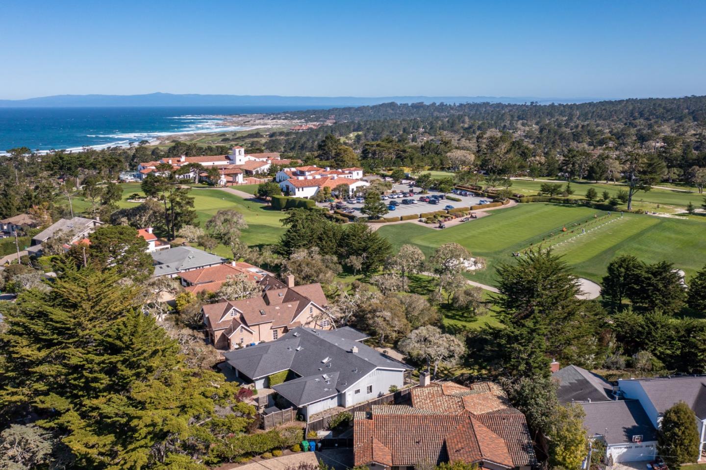 1057 Broncho Road Pebble Beach, CA 93953 - Photo 3 of 21 an aerial view of residential houses with outdoor space and trees
