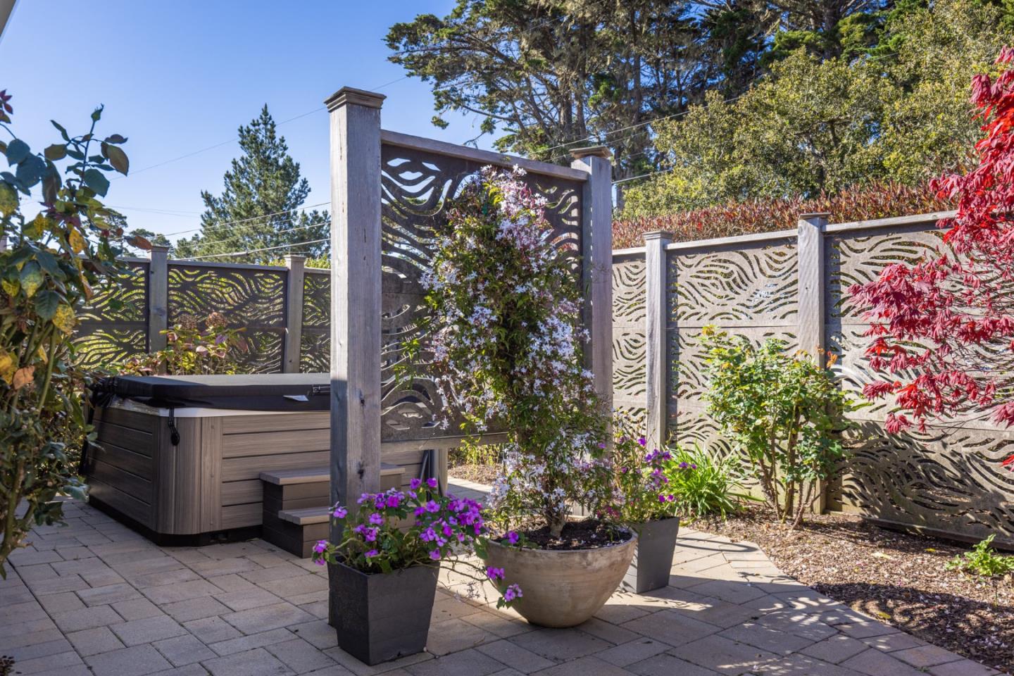 1057 Broncho Road Pebble Beach, CA 93953 - Photo 5 of 21 a sign that is on a brick wall