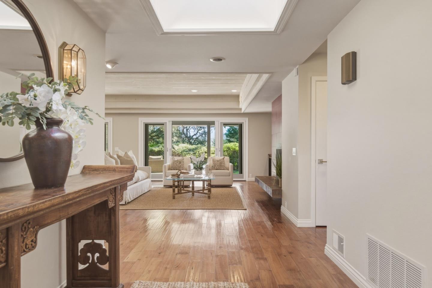 1057 Broncho Road Pebble Beach, CA 93953 - Photo 10 of 21 a living room with furniture and a potted plant