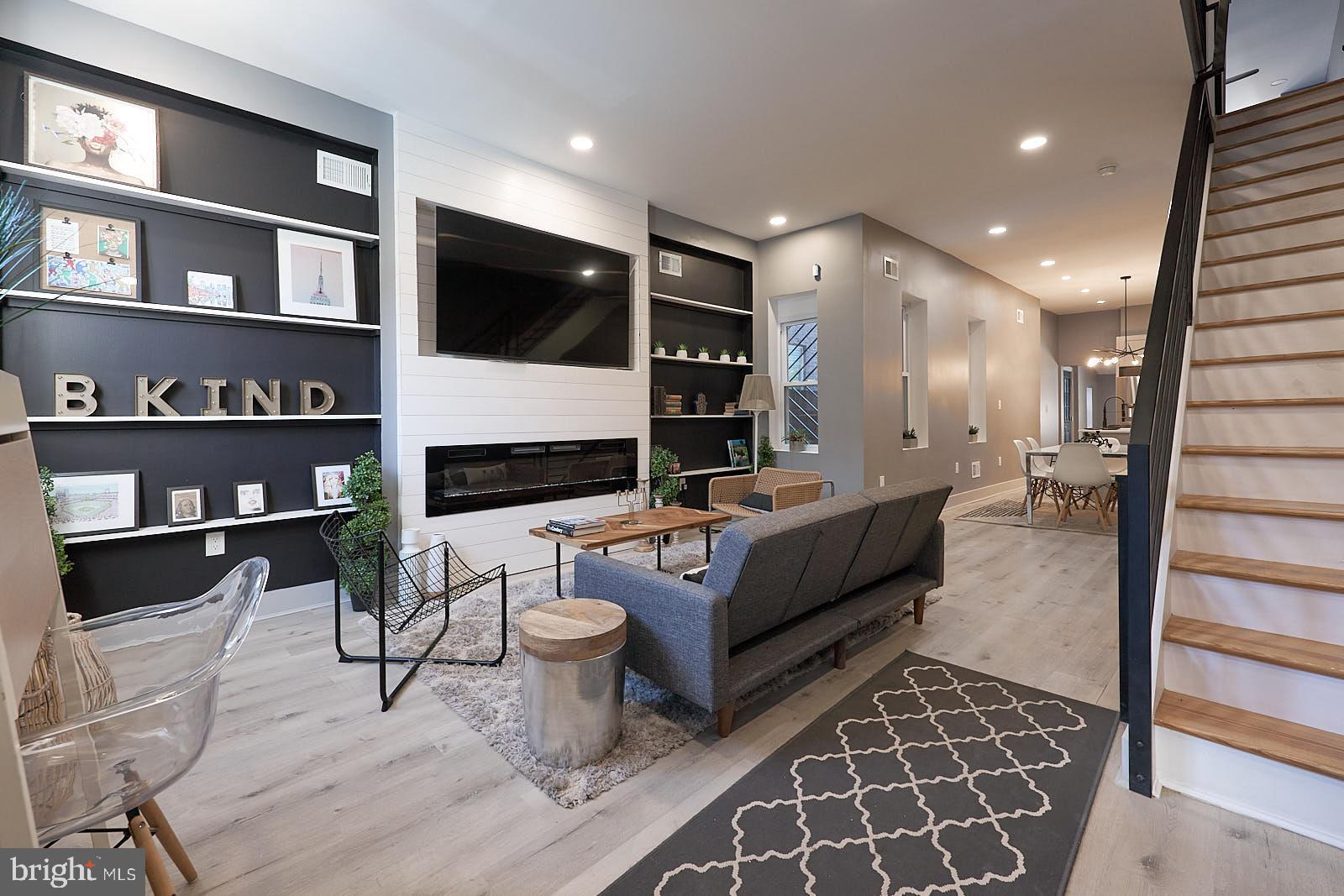 1630 North 26th Street Philadelphia, PA 19121 - Photo 3 of 50 a living room with furniture and a flat screen tv