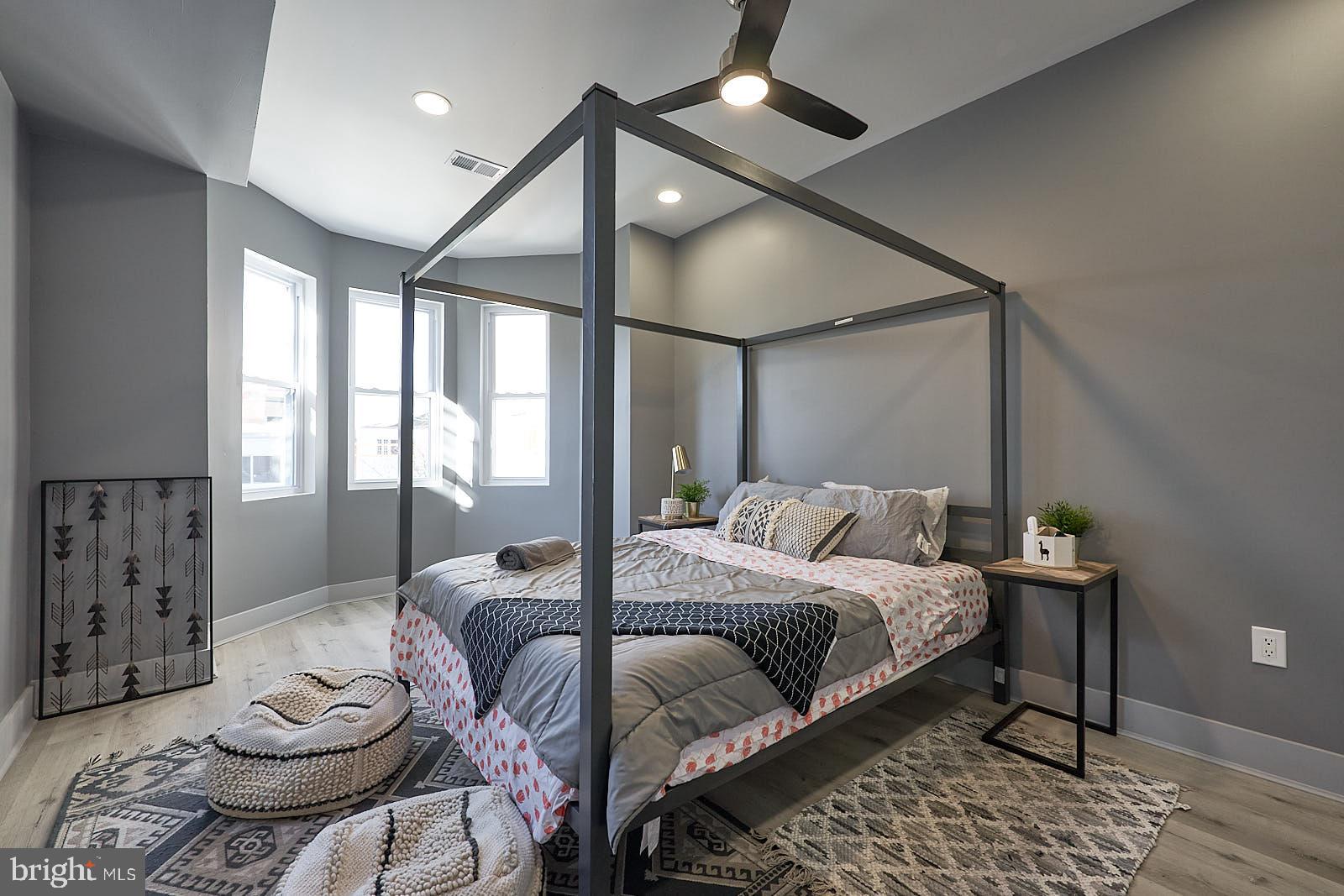 1630 North 26th Street Philadelphia, PA 19121 - Photo 41 of 50 a bedroom with a bed and window