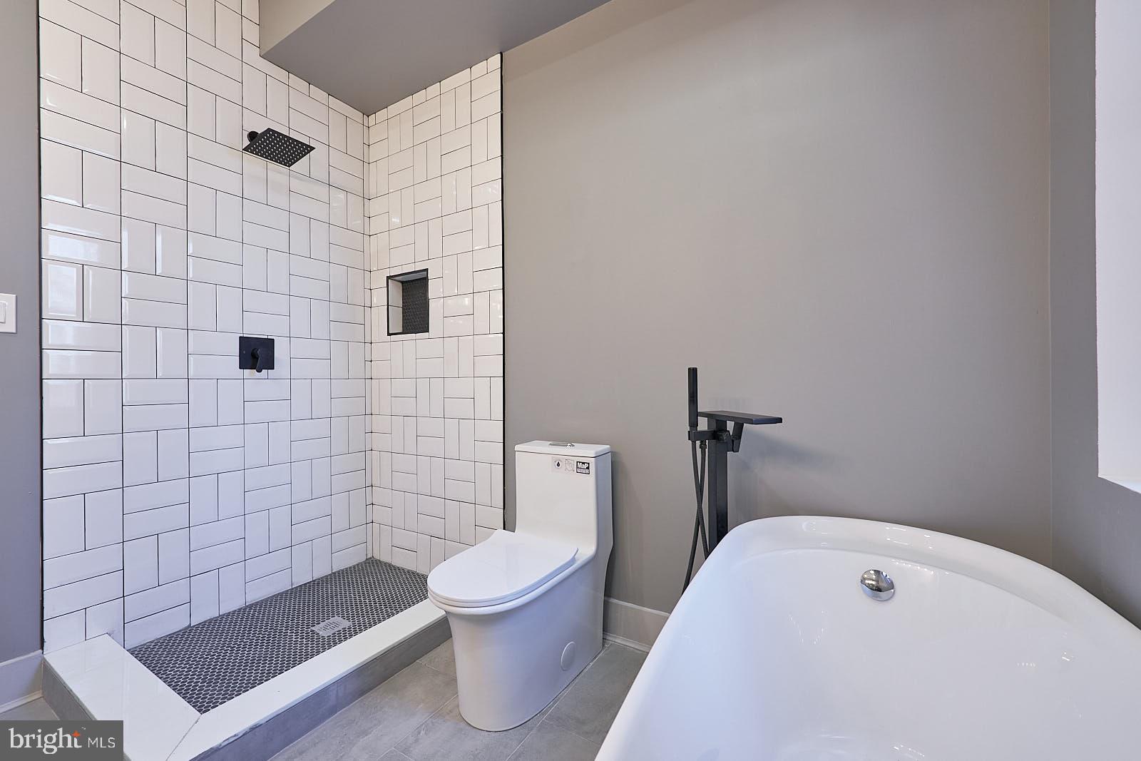 1630 North 26th Street Philadelphia, PA 19121 - Photo 47 of 50 a bathroom with a toilet and a shower