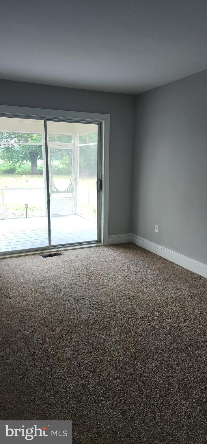 8432 Meadow Bridge Road Eden, MD 21822 - Photo 24 of 42 Bright, airy space with outdoor access.