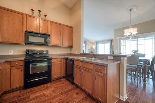a kitchen with a stove and a microwave
