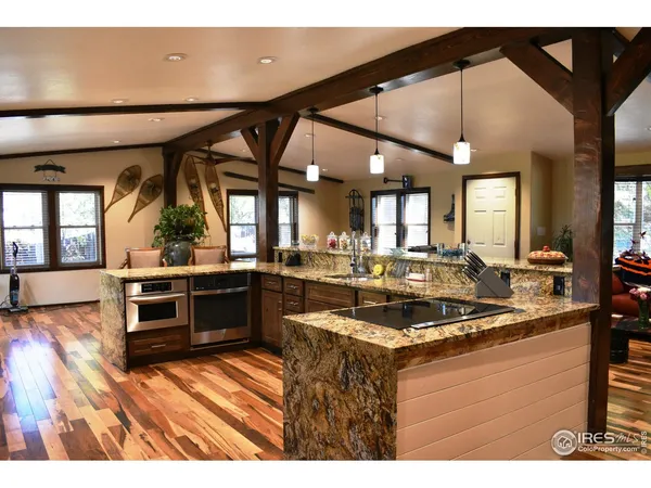 a kitchen with a stove and a microwave