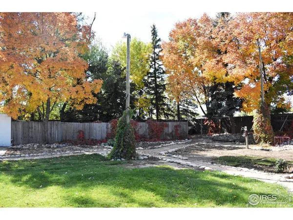 a view of a yard with an outdoor space