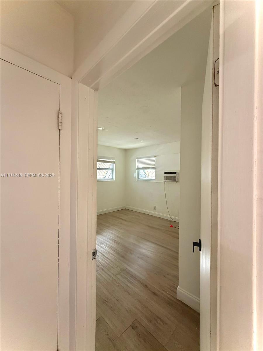 224 Southwest 10th Street, Unit 1 Hallandale Beach, FL 33009 - Photo 14 of 22 a view of wooden floor