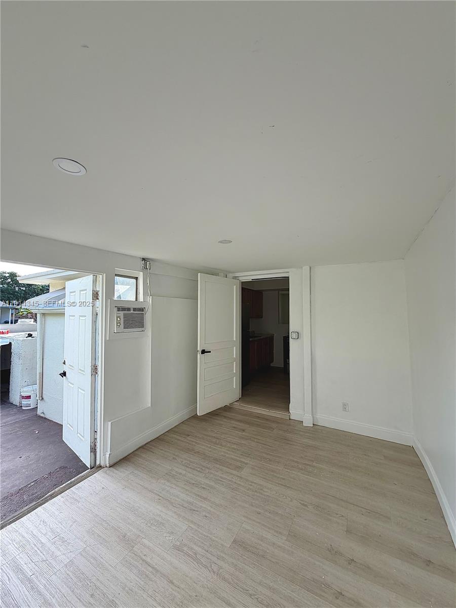 224 Southwest 10th Street, Unit 1 Hallandale Beach, FL 33009 - Photo 4 of 22 a view of an empty room