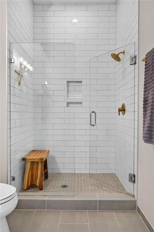 22 Airline Street Southeast, Unit PH403 Atlanta, GA 30312 - Photo 26 of 61 a bathroom with a shower