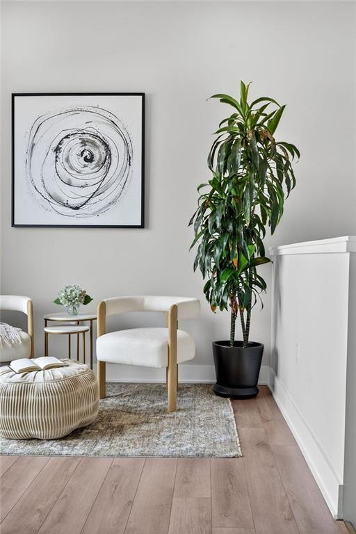22 Airline Street Southeast, Unit PH403 Atlanta, GA 30312 - Photo 29 of 61 a living room with furniture and a potted plant