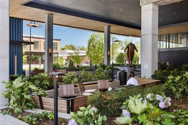 a view of a chairs and table in patio
