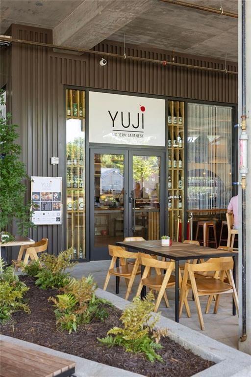 22 Airline Street Southeast, Unit PH403 Atlanta, GA 30312 - Photo 41 of 61 a front view of a building with glass door