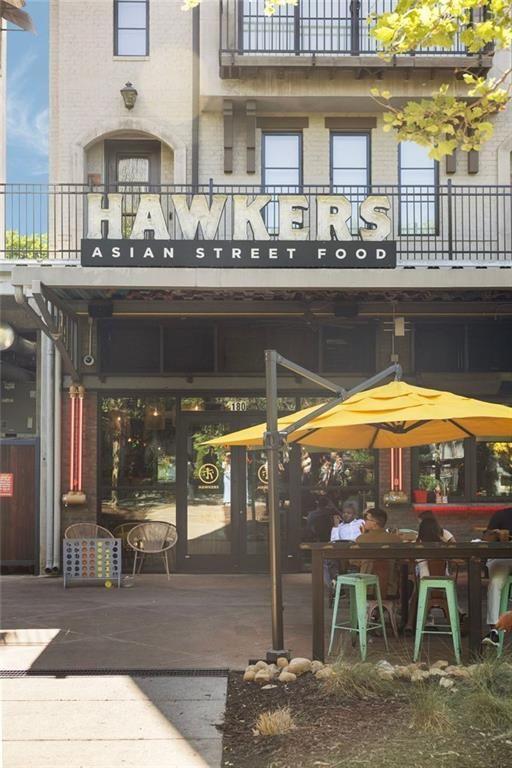 22 Airline Street Southeast, Unit PH403 Atlanta, GA 30312 - Photo 47 of 61 a view of a swimming pool with chairs in patio