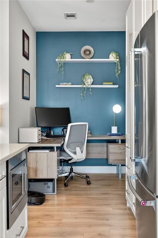 22 Airline Street Southeast, Unit PH403 Atlanta, GA 30312 - Photo 10 of 61 a bedroom with a workspace