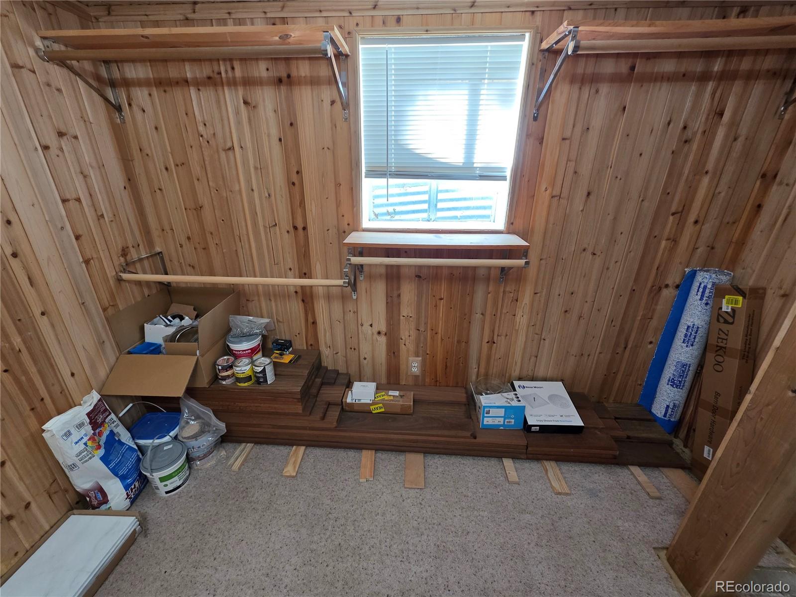 10439 Independence Street Broomfield, CO 80021 - Photo 26 of 30 a living room with furniture and a window