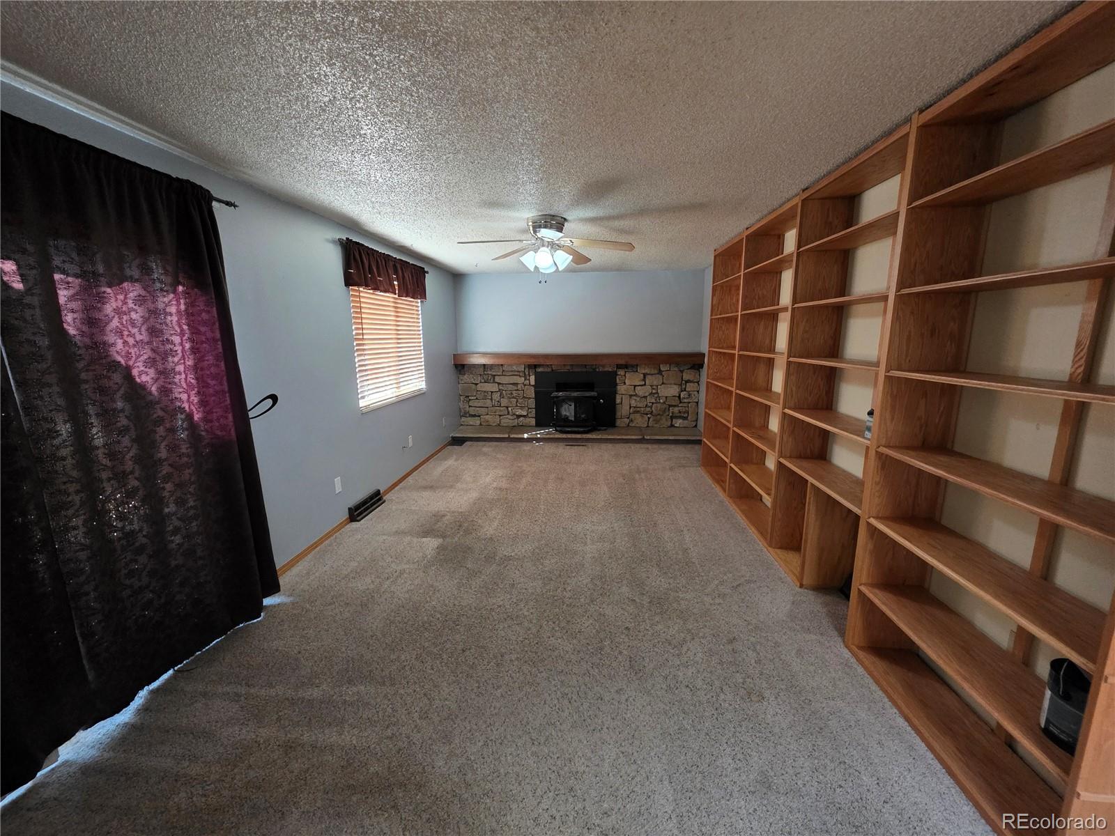 10439 Independence Street Broomfield, CO 80021 - Photo 8 of 30 a view of a livingroom with furniture and staircase