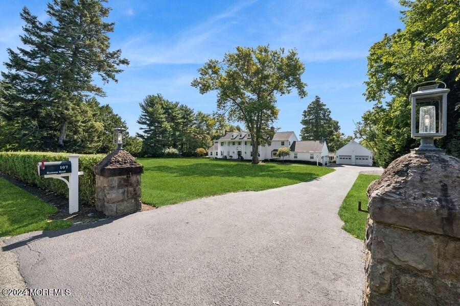 107 Rumson Road Rumson, NJ 07760 - Photo 2 of 46 a view of a garden with large trees