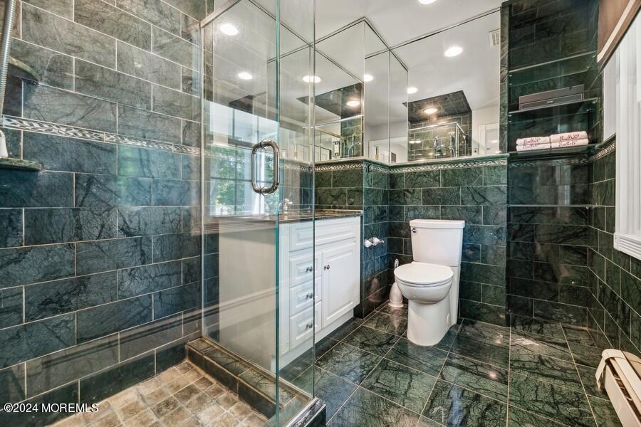 107 Rumson Road Rumson, NJ 07760 - Photo 23 of 46 a bathroom with a toilet and a shower