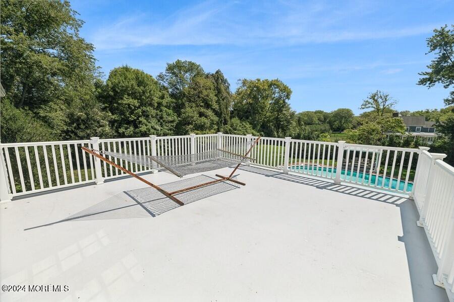 107 Rumson Road Rumson, NJ 07760 - Photo 26 of 46 a view of balcony with wooden fence