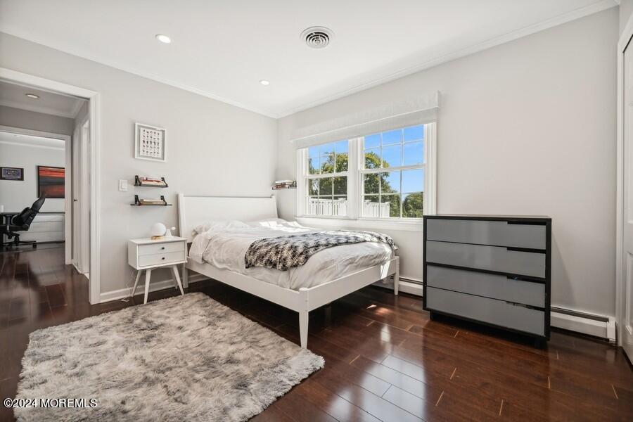 107 Rumson Road Rumson, NJ 07760 - Photo 28 of 46 a bedroom with a bed and a dresser