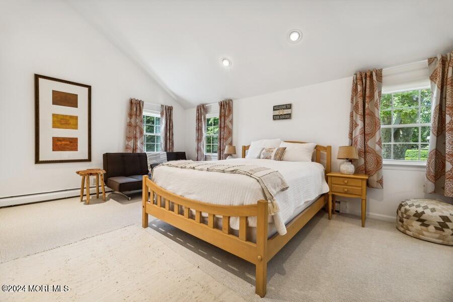 107 Rumson Road Rumson, NJ 07760 - Photo 29 of 46 a spacious bedroom with a bed and a window