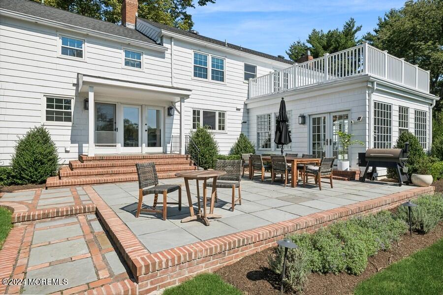 107 Rumson Road Rumson, NJ 07760 - Photo 35 of 46 a view of a house with patio