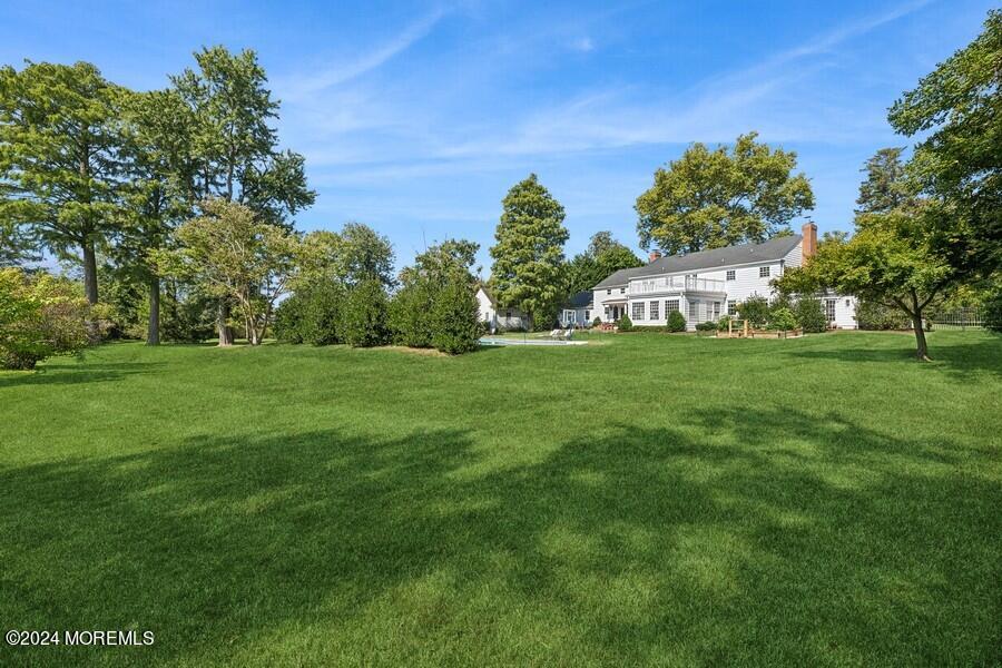 107 Rumson Road Rumson, NJ 07760 - Photo 43 of 46 a house view with a garden space