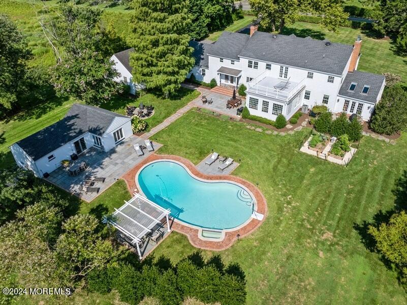 107 Rumson Road Rumson, NJ 07760 - Photo 44 of 46 an aerial view of a house with outdoor space pool seating area and yard