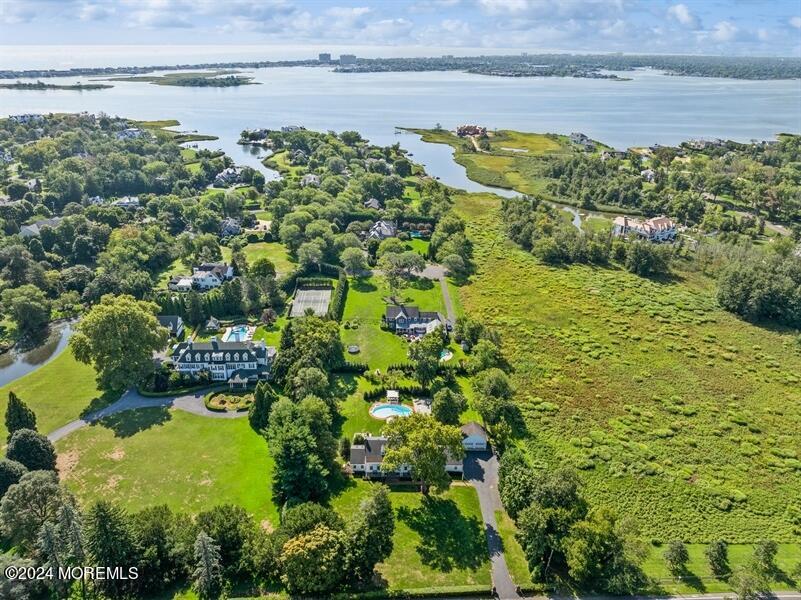 107 Rumson Road Rumson, NJ 07760 - Photo 46 of 46 a view of a lake with a building