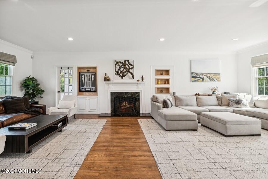 107 Rumson Road Rumson, NJ 07760 - Photo 5 of 46 a living room with furniture and a fireplace