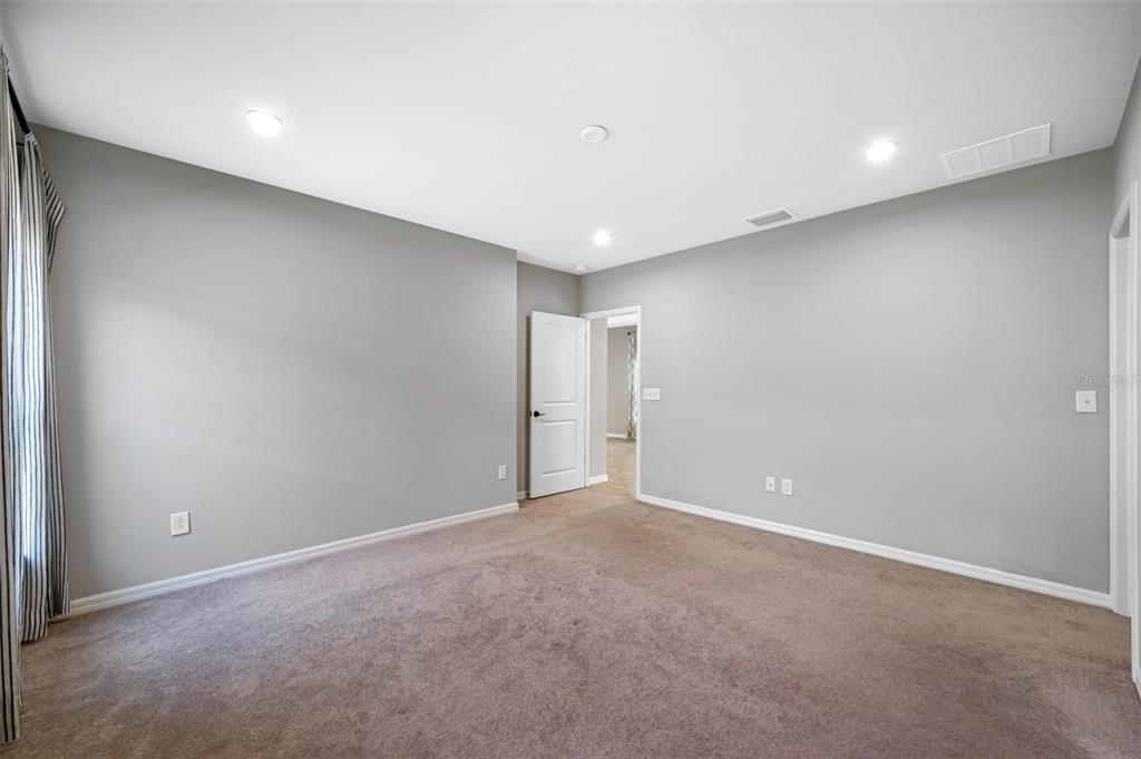 11230 High Noon Trail Parrish, FL 34219 - Photo 16 of 40 a view of an empty room