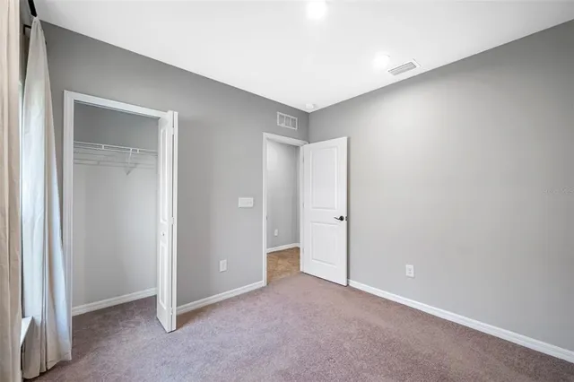 a view of backyard with green space