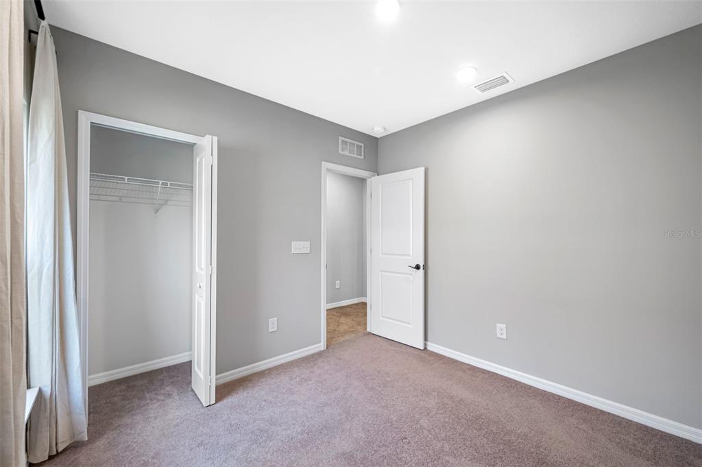 11230 High Noon Trail Parrish, FL 34219 - Photo 23 of 40 a view of an empty room