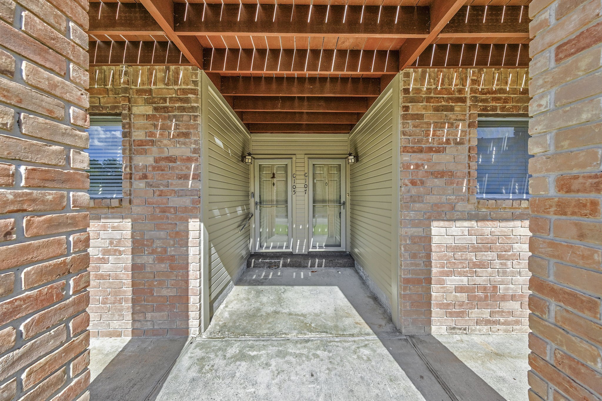 801 River Road, Unit 105C Montgomery, TX 77356 - Photo 4 of 30 Enjoy the ease and convenience of first-floor living with quick access to the pool and beautiful Lake Conroe views.