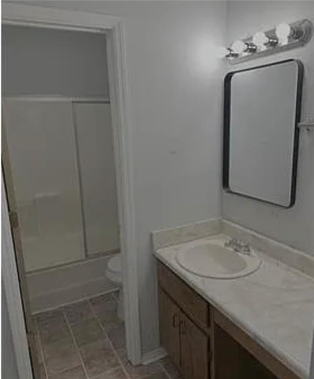 2305 Pine Tree Trail Atlanta, GA 30349 - Photo 11 of 12 a bathroom with a sink and a mirror