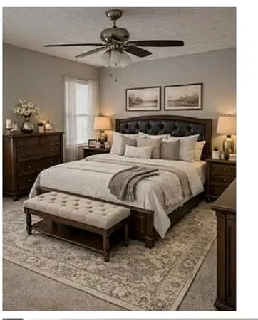 a spacious bedroom with a bed a couch and chandelier