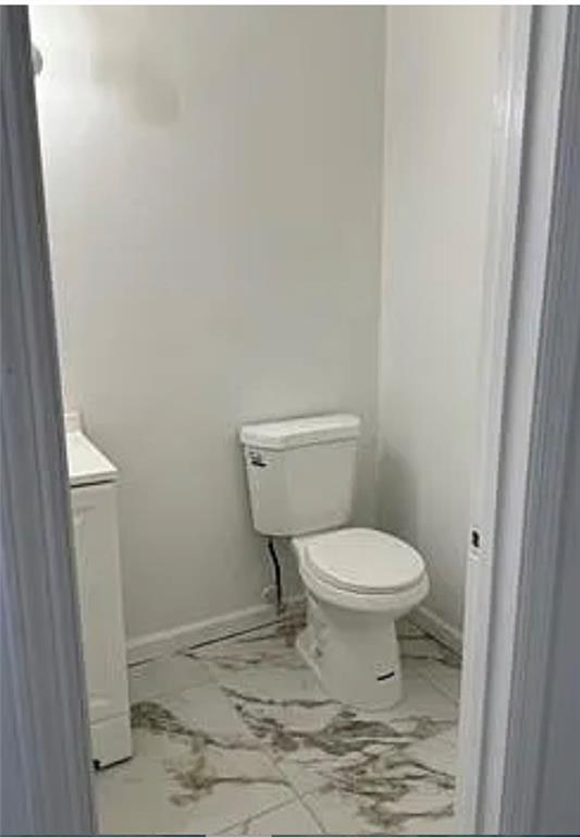 2305 Pine Tree Trail Atlanta, GA 30349 - Photo 10 of 12 a white toilet sitting next to a shower