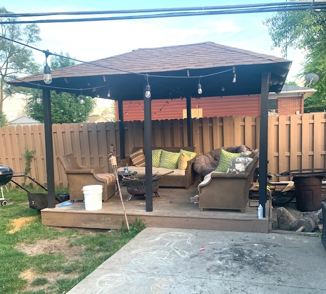 653 South Wayne Place Wheeling, IL 60090 - Photo 12 of 14 a view of patio with a table and chairs