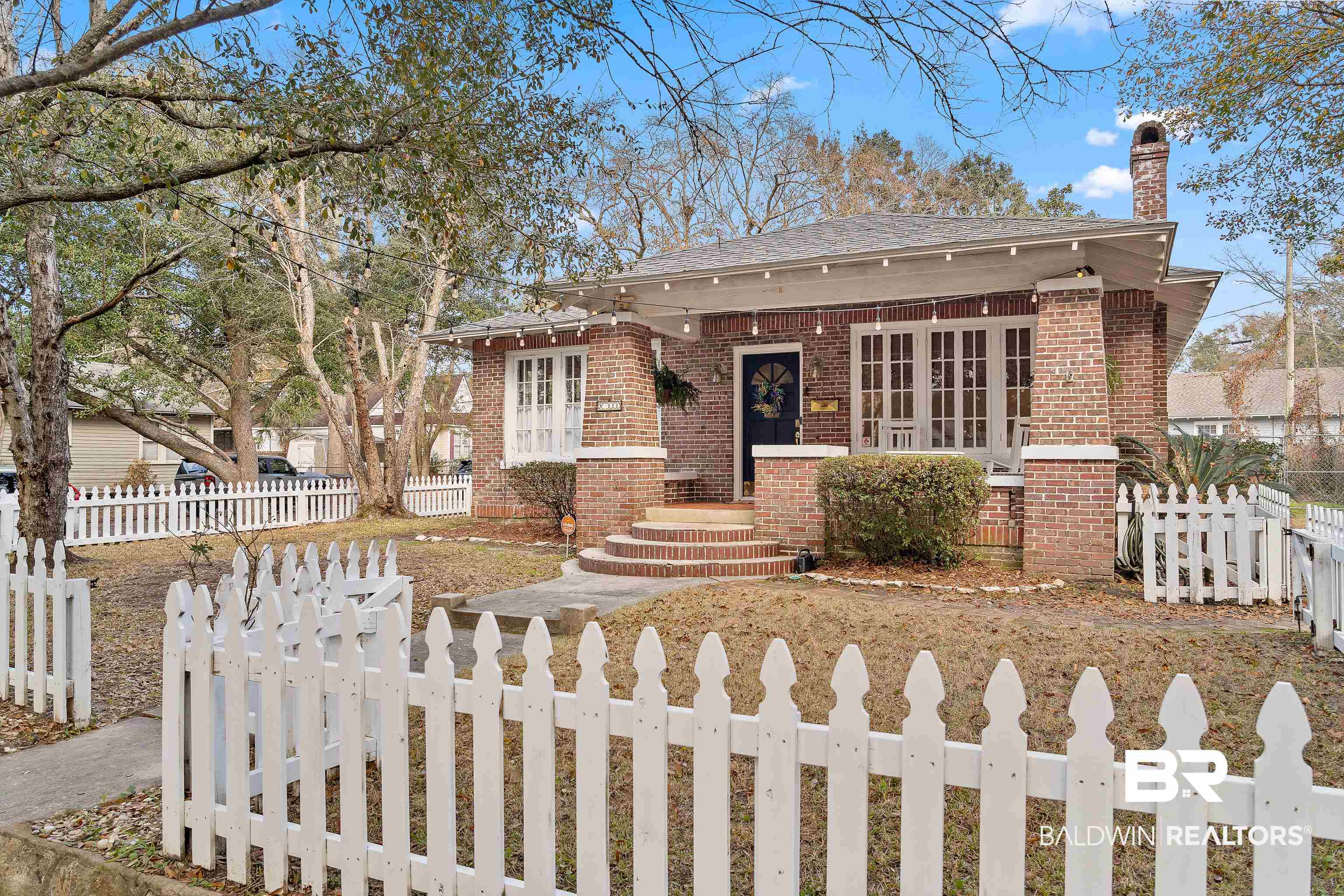 111 Macy Place Mobile, AL 36604 - Photo 2 of 35 White picket fence front yard