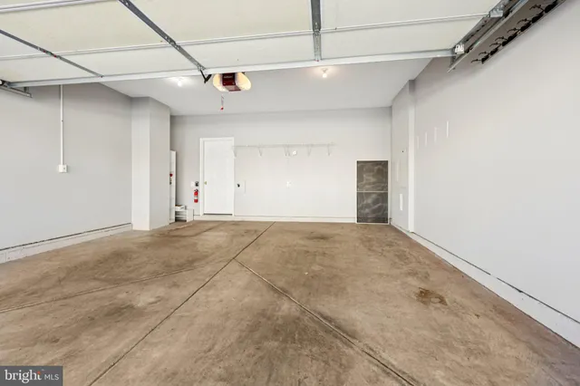 a bathroom with a shower a toilet and a shower