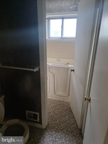 a bathroom with a toilet