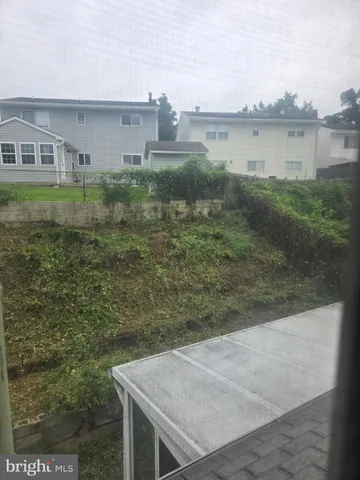 a view of a lake with a building in the background