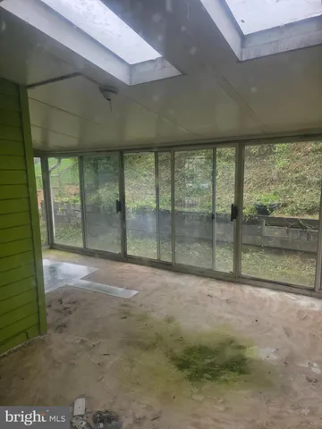 a view of outdoor space with sliding door