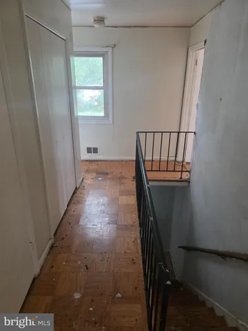 a view of entryway with a wooden floor