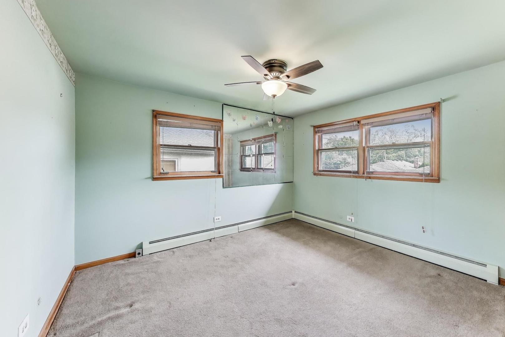4121 Maple Avenue Lyons, IL 60534 - Photo 12 of 32 a view of empty room with windows