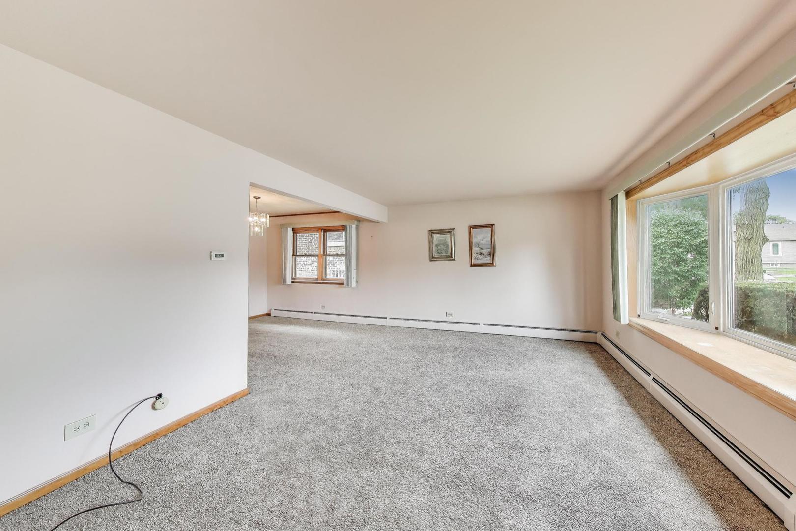 4121 Maple Avenue Lyons, IL 60534 - Photo 2 of 32 an empty room with windows