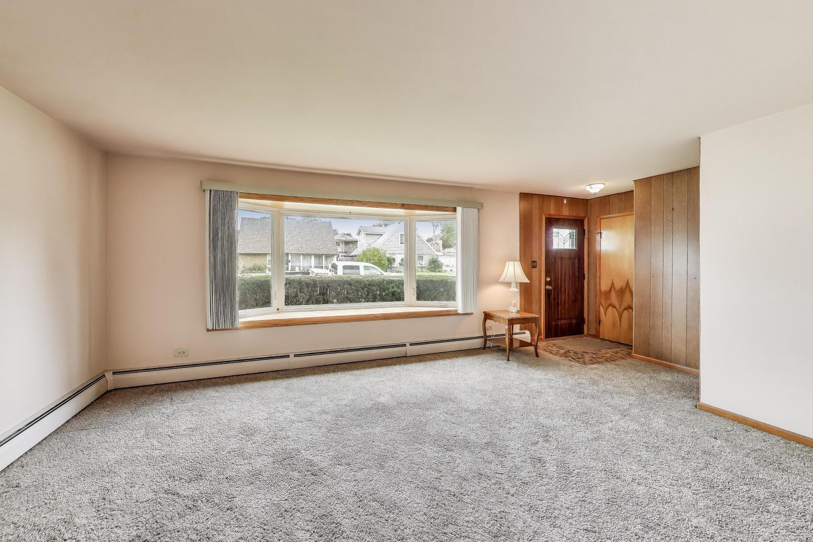 4121 Maple Avenue Lyons, IL 60534 - Photo 3 of 32 an empty room with window